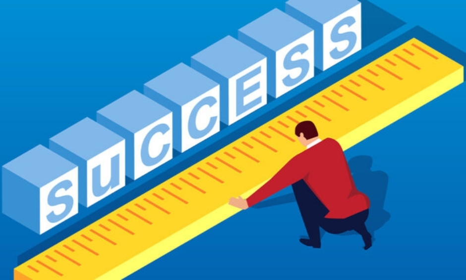 Blue background, with white 3D blocks with blue letters spelling Success with illustration of person measuring with a ruler